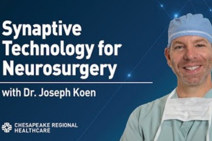 surgeon in front of blue background